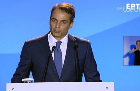 Greek Prime MInister Mitsotakis offers food and gifts to people in need